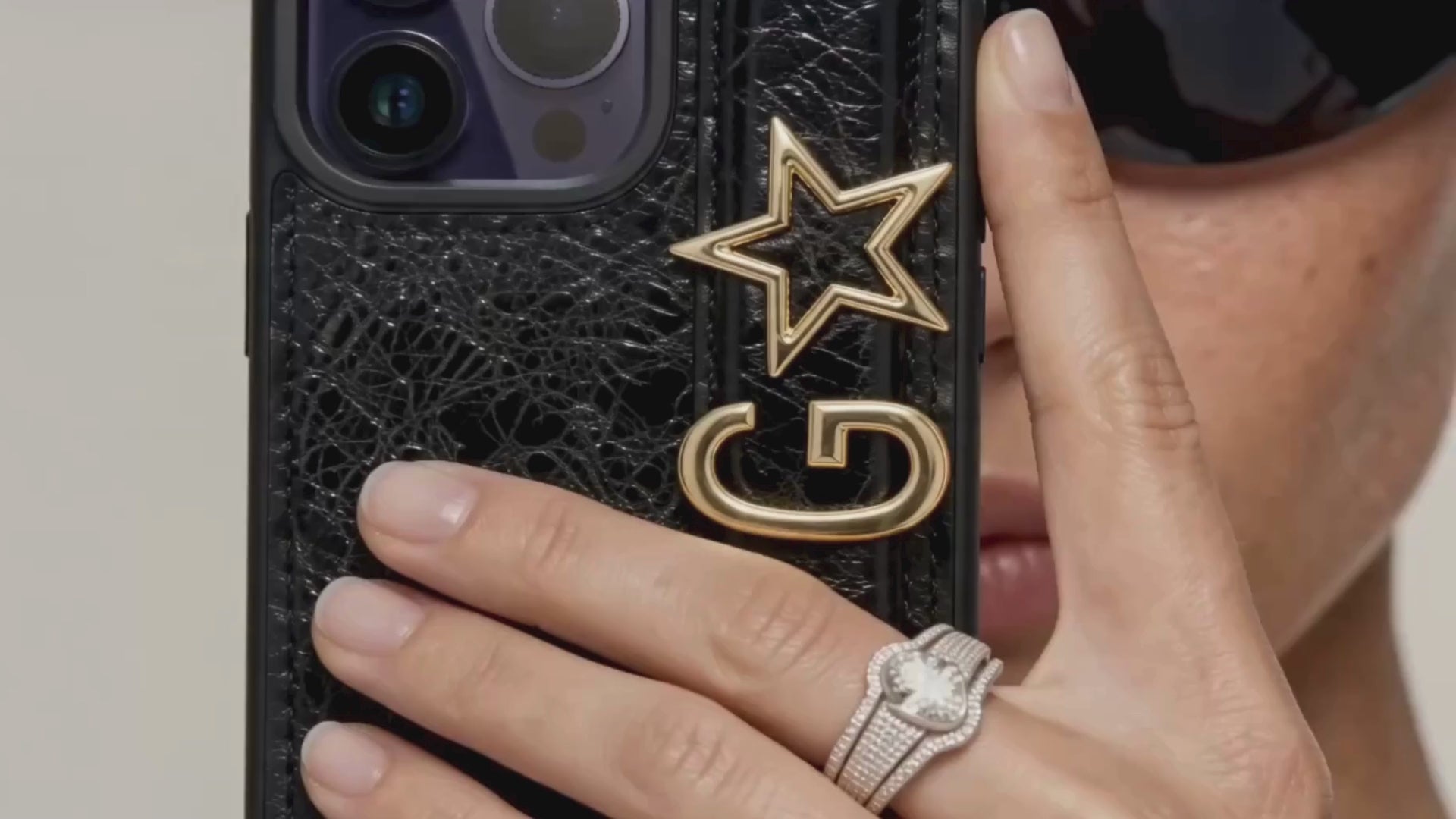 Personalized leather iPhone cases choose letter and symbol charms, two free. Genuine leather, soft-touch lining. Free US shipping over $70.