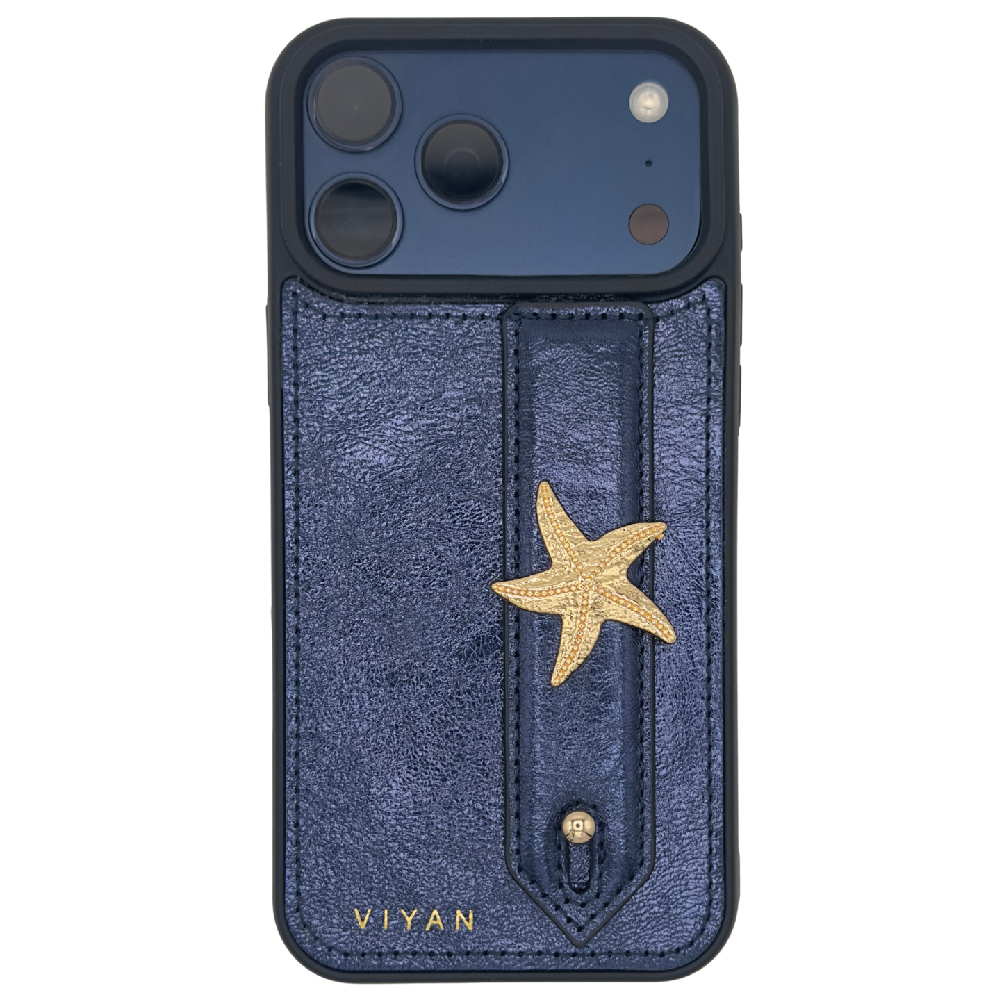 Gold-tone starfish charm on a Navy VIYAN leather iPhone case, shown at an angle #gold