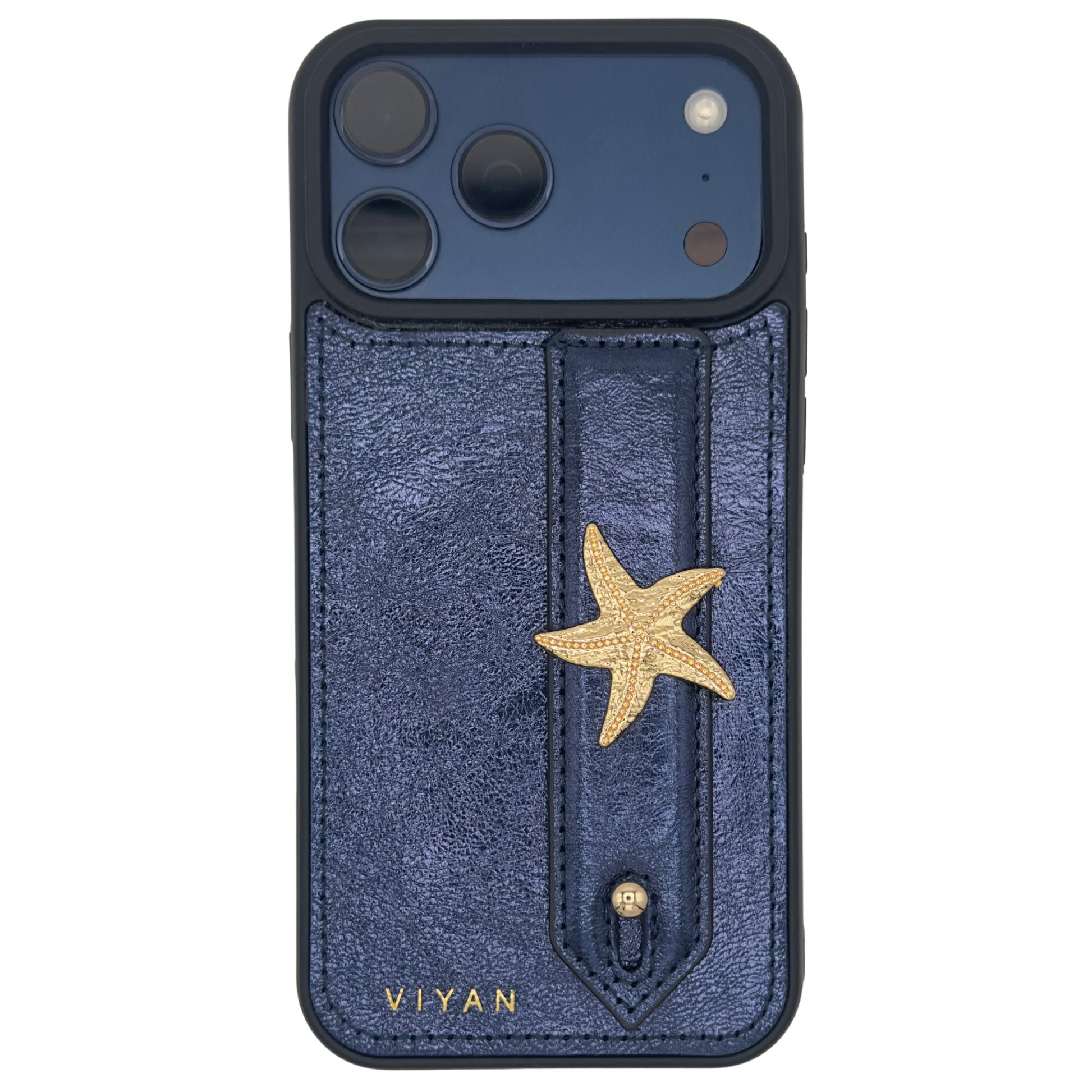 Gold-tone starfish charm on a Navy VIYAN leather iPhone case, shown at an angle #gold
